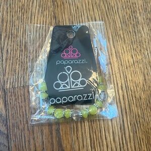 Green and clear paparazzi bracelet.